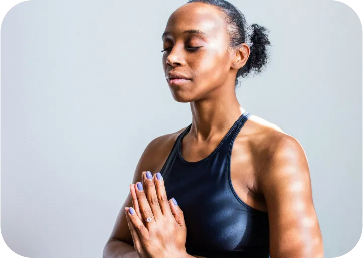 Woman meditating - wellness